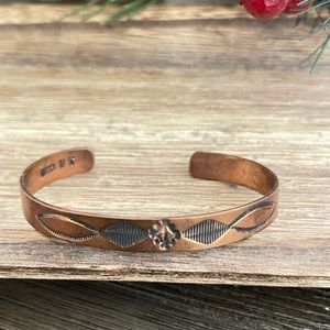 Native American design stamped copper bracelet